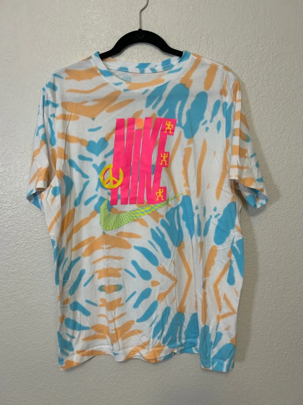 Nike Pink Graphic Tie-Dye Tee with Blue and Orange Accents - Picture 1 of 6